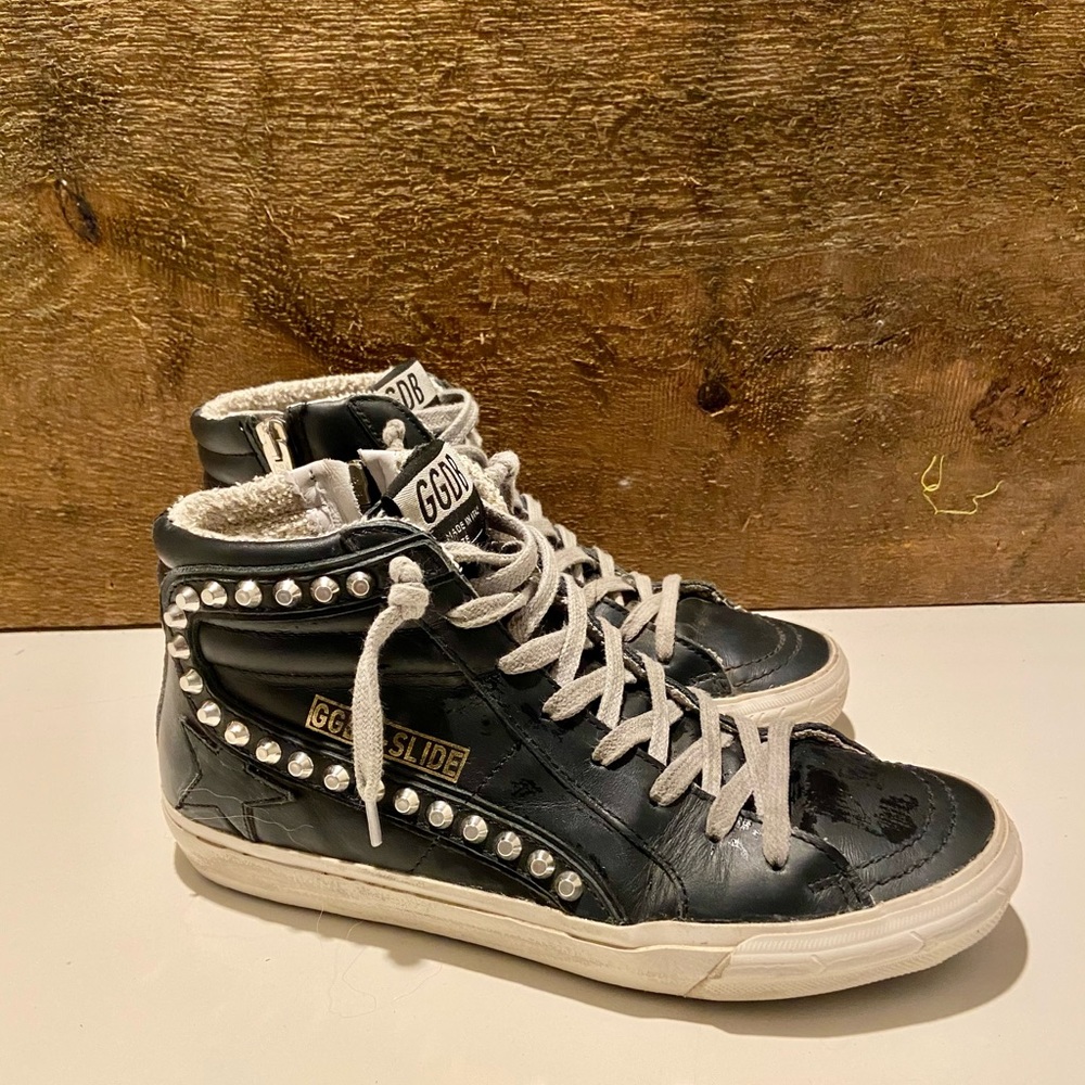 Golden Goose studded high tops.